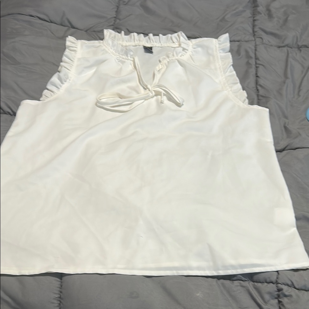 White Sleeveless Blouse with Ruffle Details